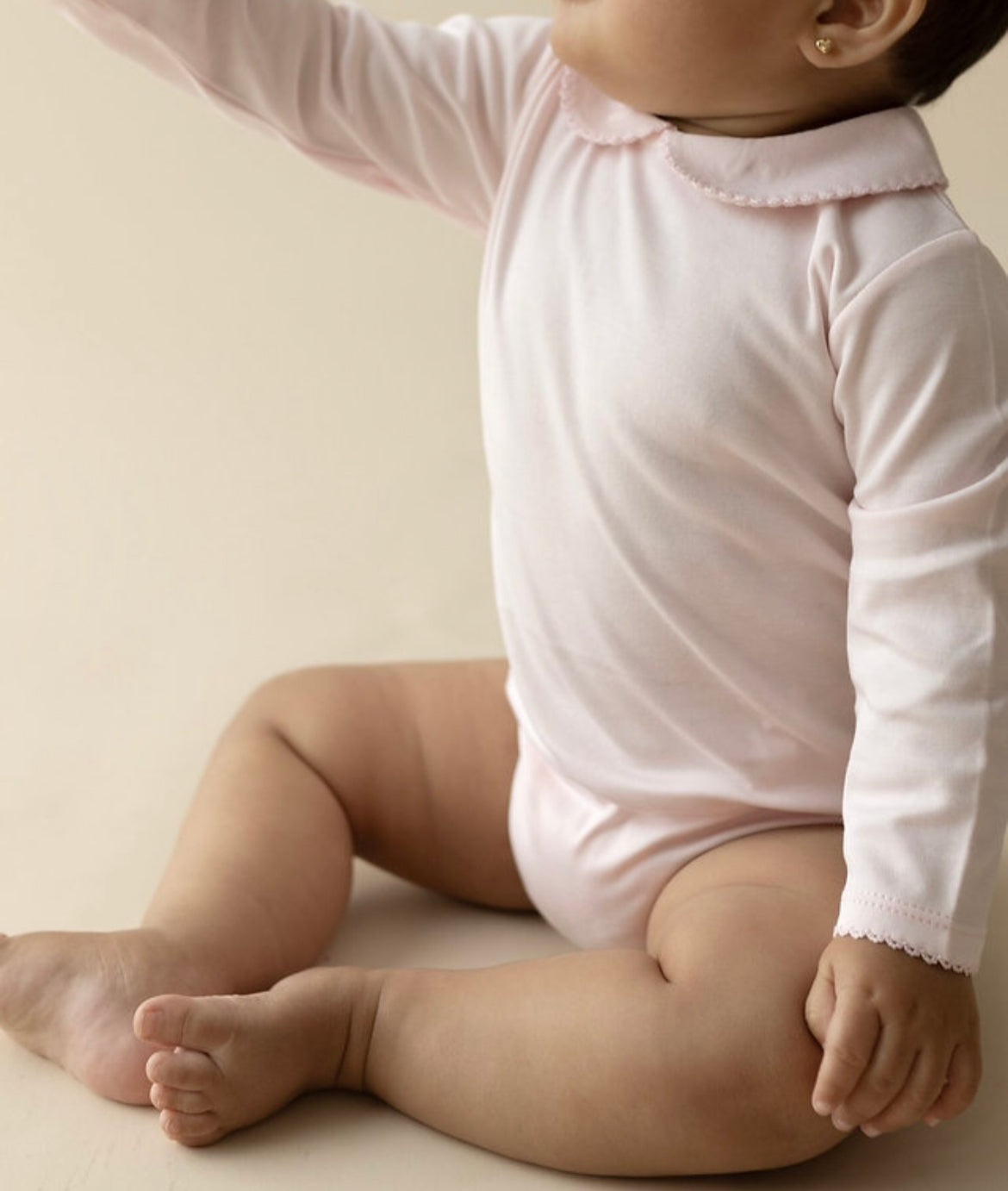 Body rosado cuello bebé