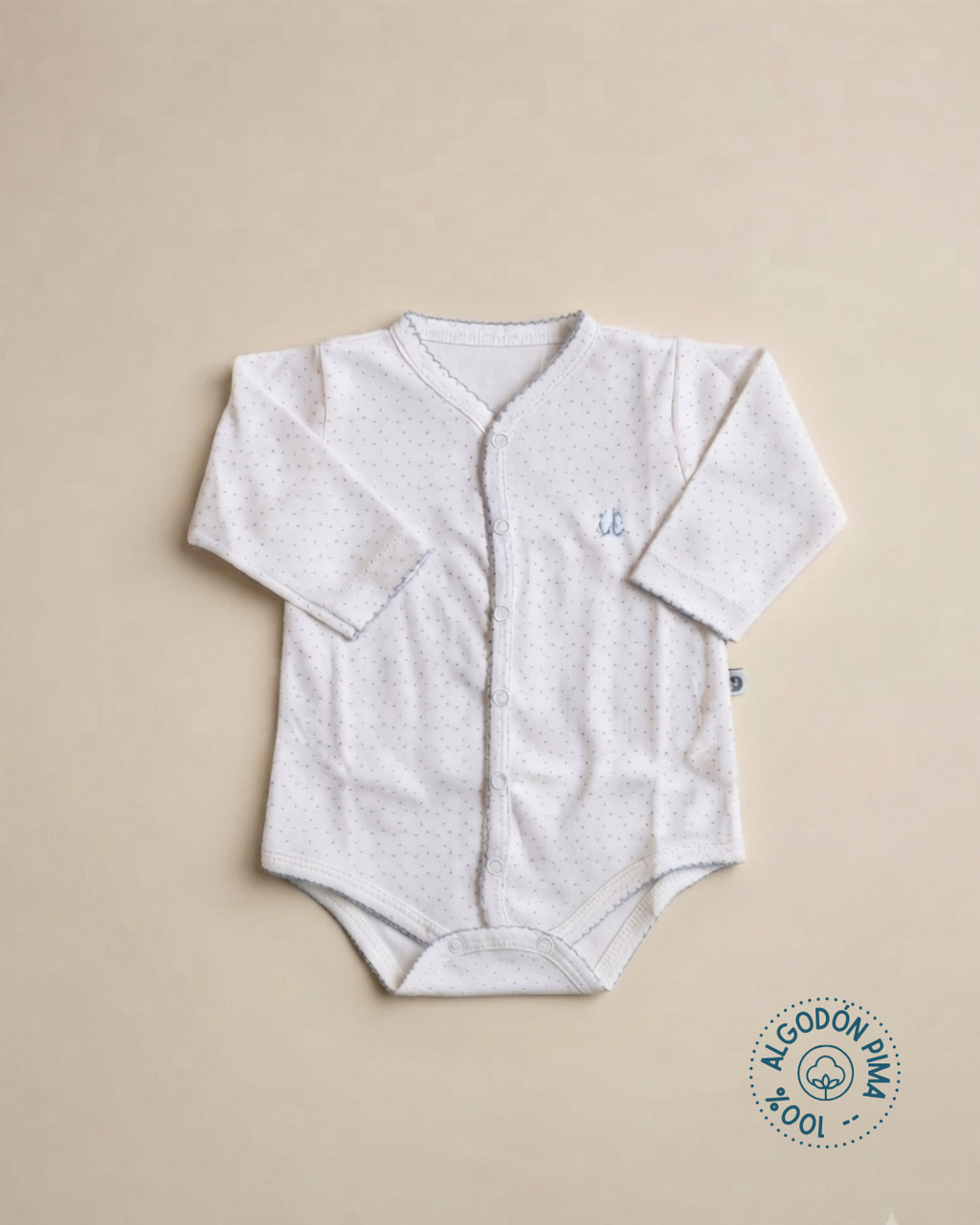 Body 100% algodón pima botones delanteros puntitos celeste