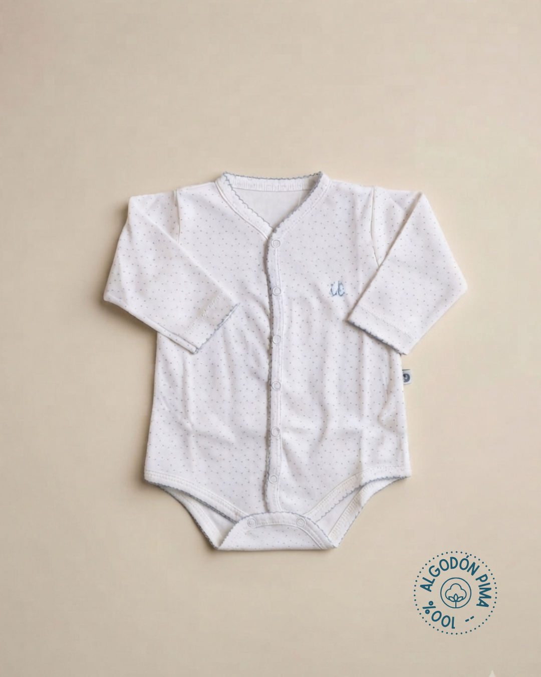 Body 100% algodón pima botones delanteros puntitos celeste