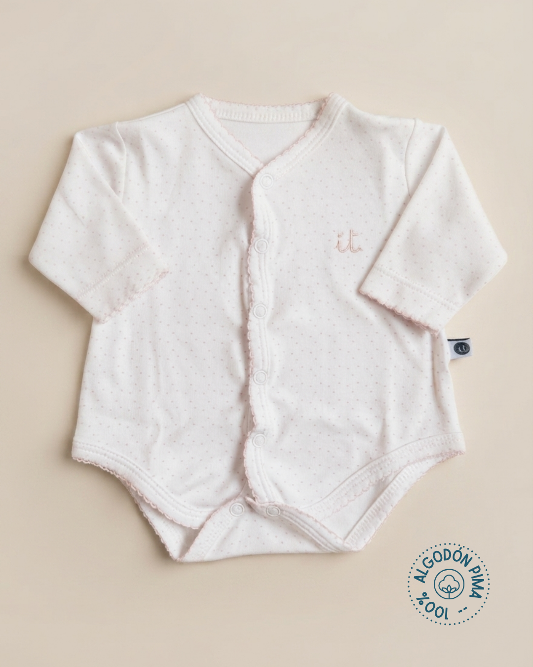 Body 100% algodón pima botones delanteros puntitos rosa